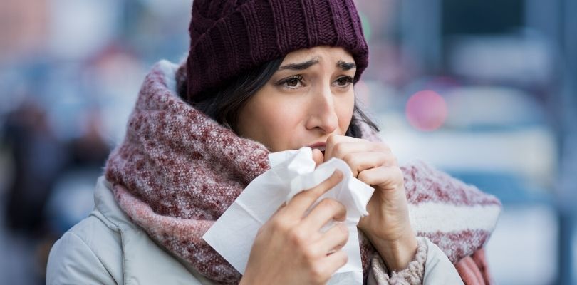 Someone coughing in the cold weather due to COPD.